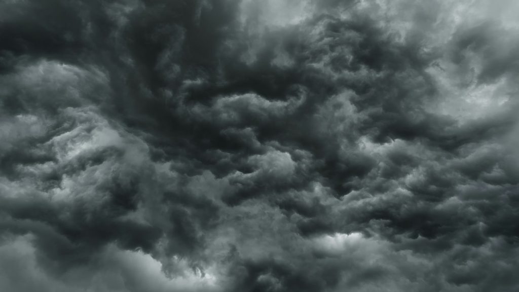 dense dark grey storm clouds filling the sky