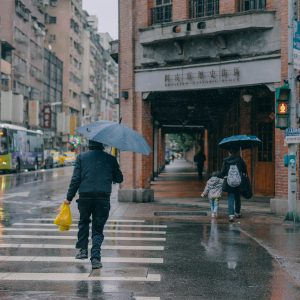 an open umbrella held against the rain
